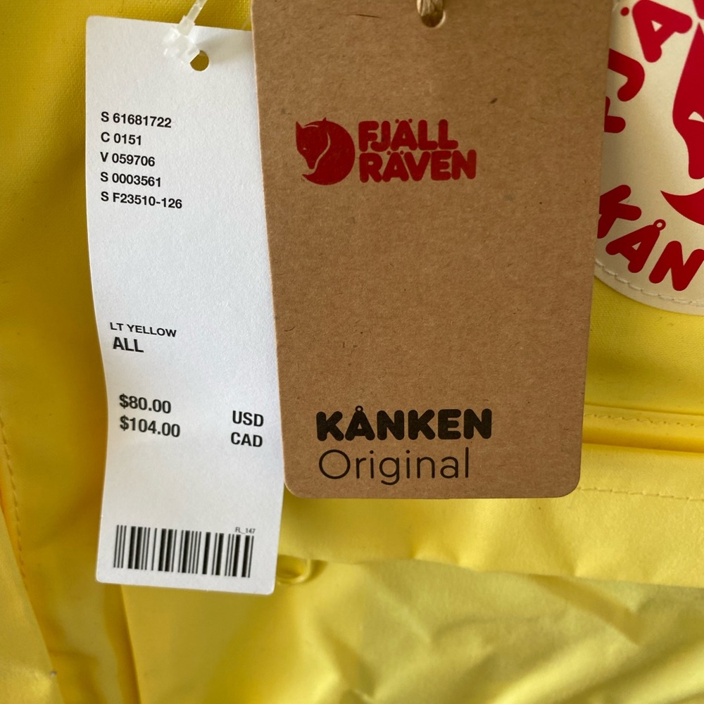 never used yellow Kanken backpack